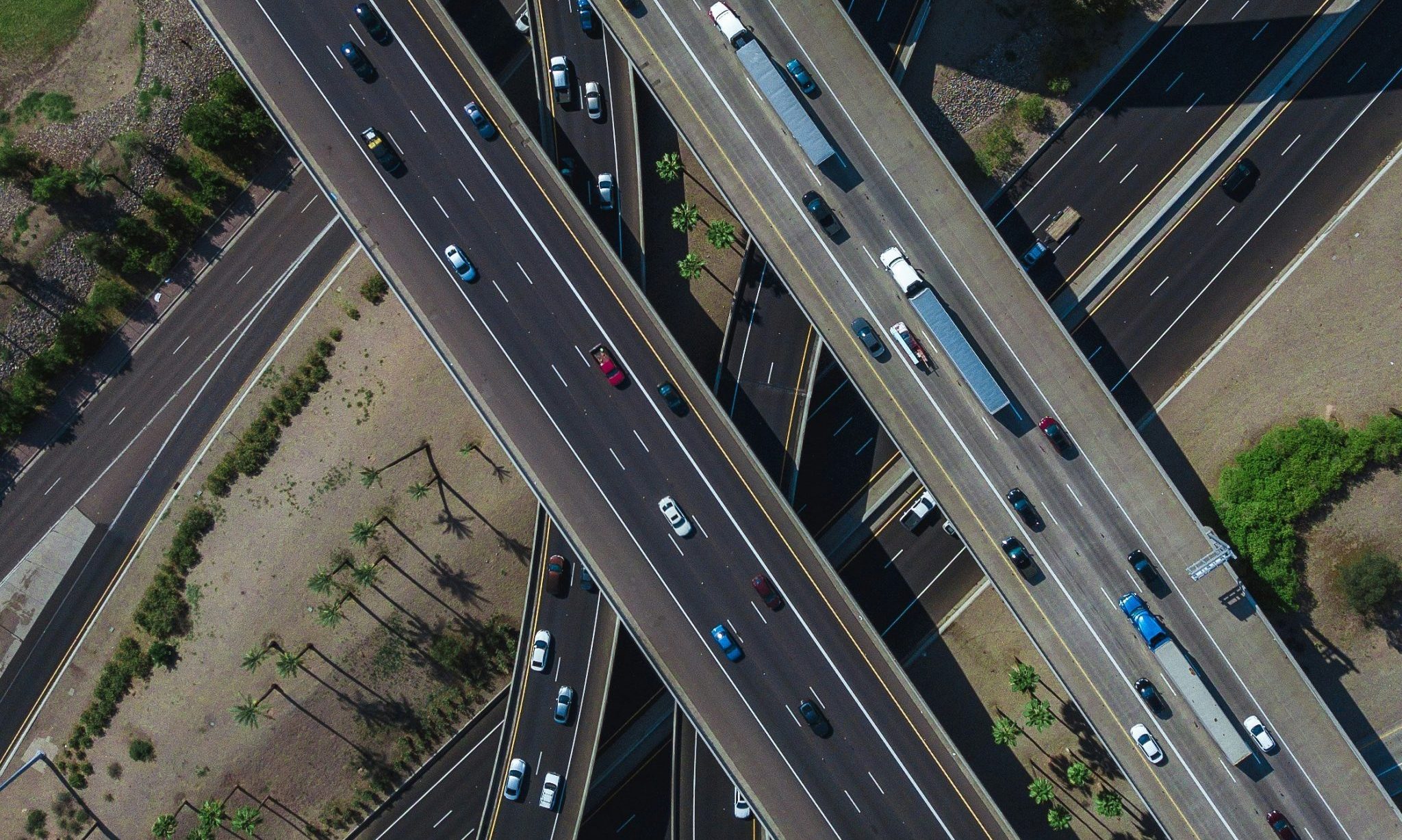 An ariel view of an overpass with cars on it. 
